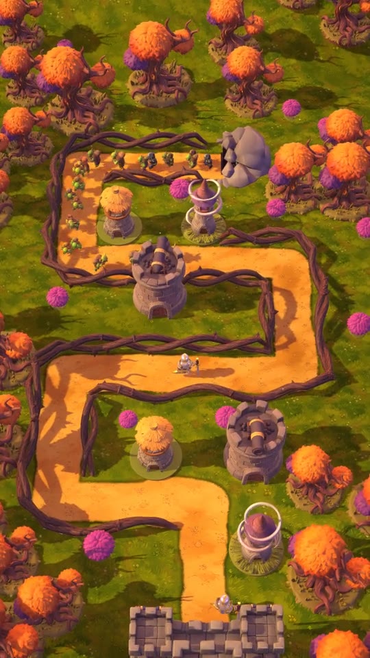 A winding road through an autumn forest, seen from above